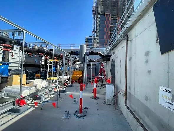 Classic Air and Mechanical Services team installing rooftop plant on a commercial site in Adelaide